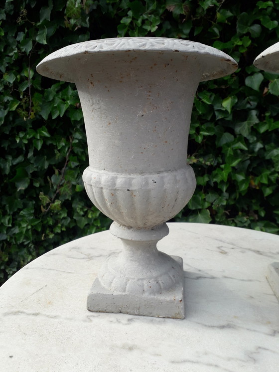 Image 1 of 2 Cast iron brocante vases 32 cm high