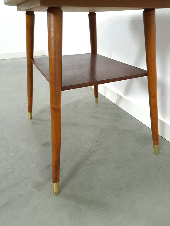 Image 1 of Dark veneer table with gold legs