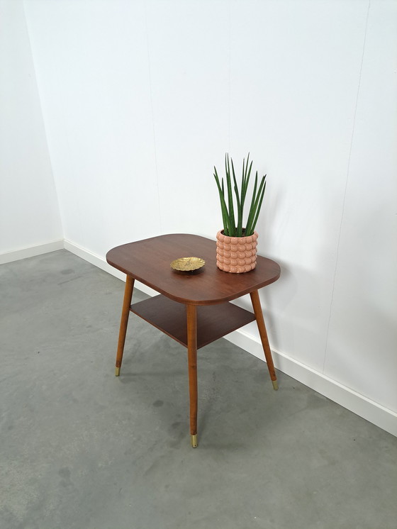 Image 1 of Dark veneer table with gold legs