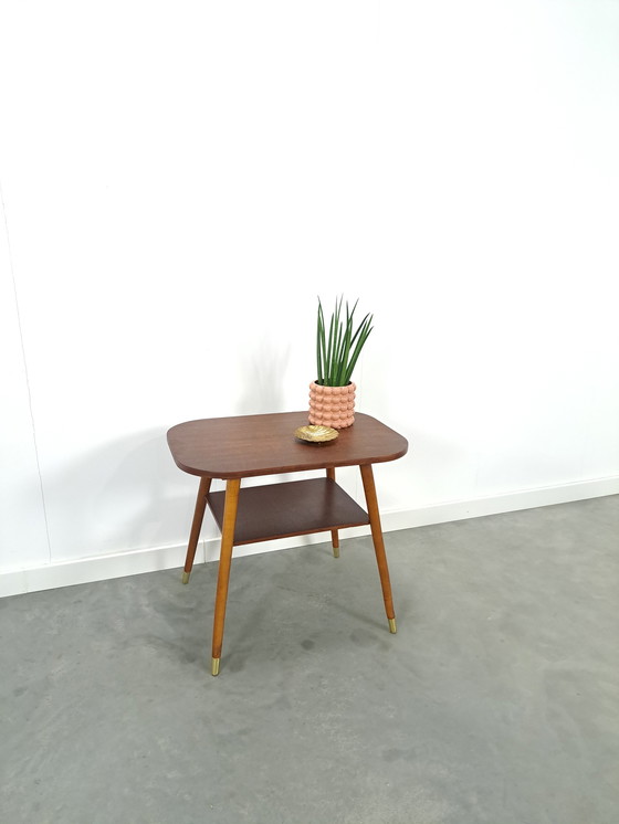 Image 1 of Dark veneer table with gold legs