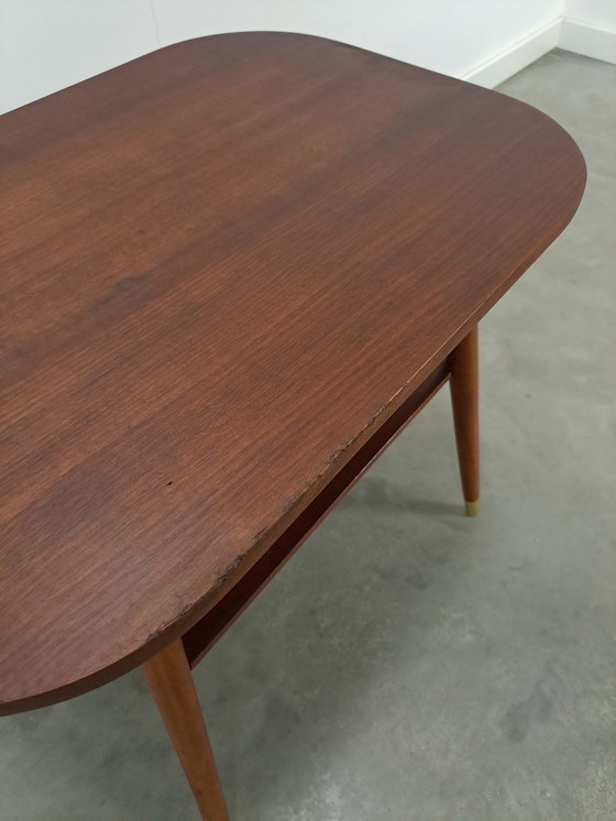 Image 1 of Dark veneer table with gold legs