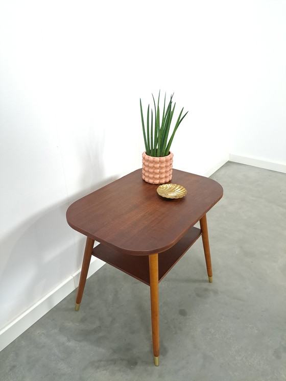 Image 1 of Dark veneer table with gold legs