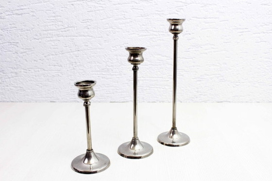 Image 1 of Trio of silver metal candlesticks from the 1950s