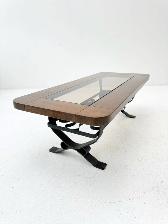 Image 1 of Wrought iron coffee table with smoked glass top & solid wood frame