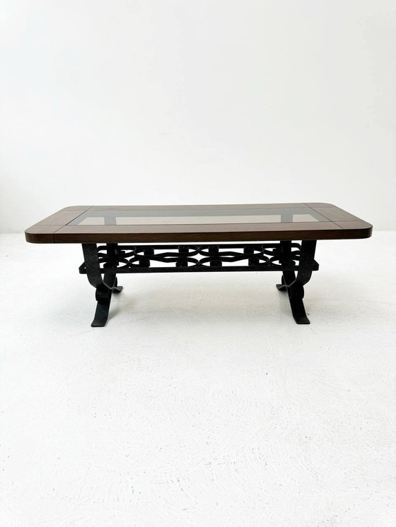 Image 1 of Wrought iron coffee table with smoked glass top & solid wood frame