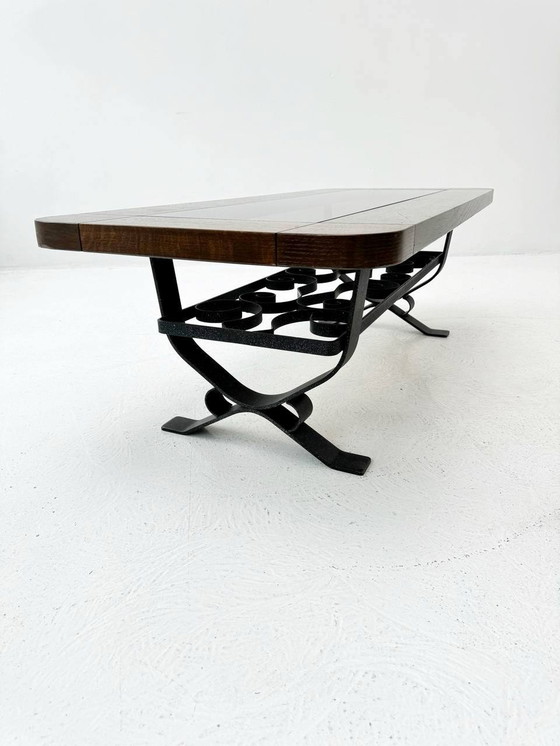 Image 1 of Wrought iron coffee table with smoked glass top & solid wood frame