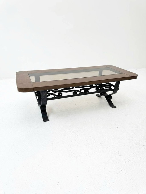 Wrought iron coffee table with smoked glass top & solid wood frame