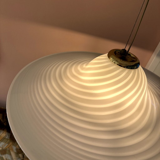 Swirling pendant lamp made of Murano glass