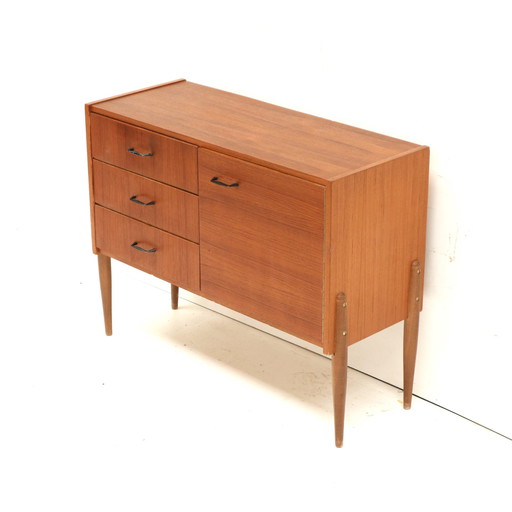 Vintage dresser with drawers and door made in the 1960s