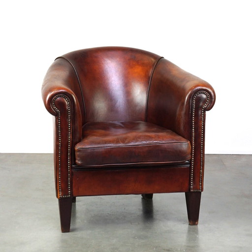 Fauteuil club en cuir de mouton marron foncé