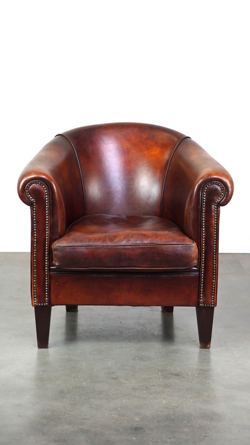 Fauteuil club en cuir de mouton marron foncé