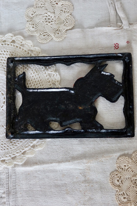 Image 1 of Large Vintage Chippie Cast Iron Trivet.