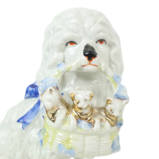 Image 1 of Paire de chiens anciens en porcelaine Art Nouveau