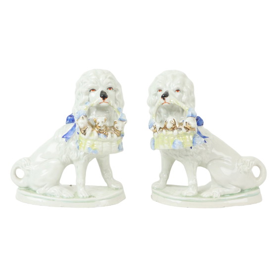 Image 1 of Paire de chiens anciens en porcelaine Art Nouveau