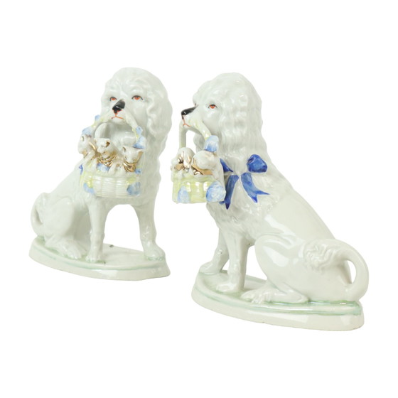 Image 1 of Paire de chiens anciens en porcelaine Art Nouveau