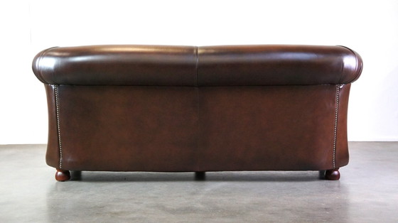 Image 1 of Smooth chesterfield sofa from Springvale