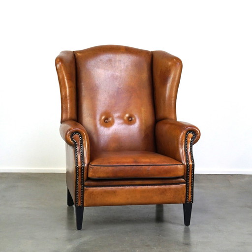 Ear armchair made of sheep leather