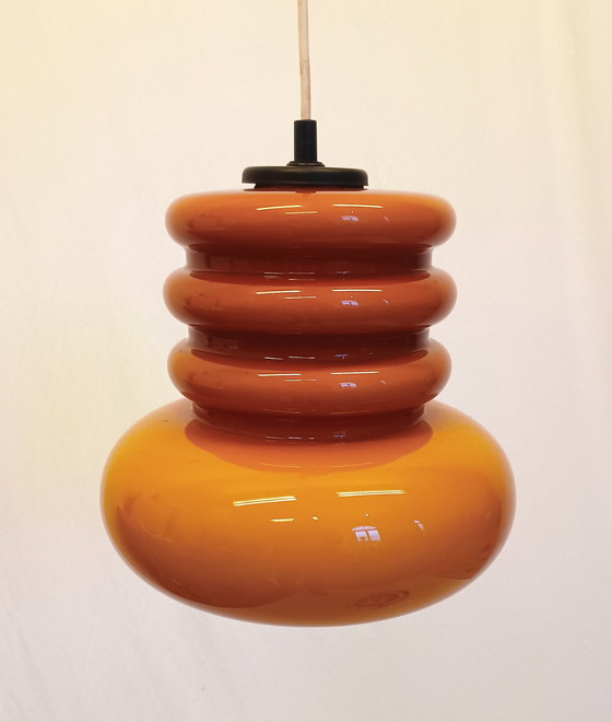 Image 1 of Lampe suspendue de l'ère spatiale en verre orange de Peill et Putzler