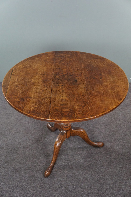 Image 1 of Large English oak tilt-top table