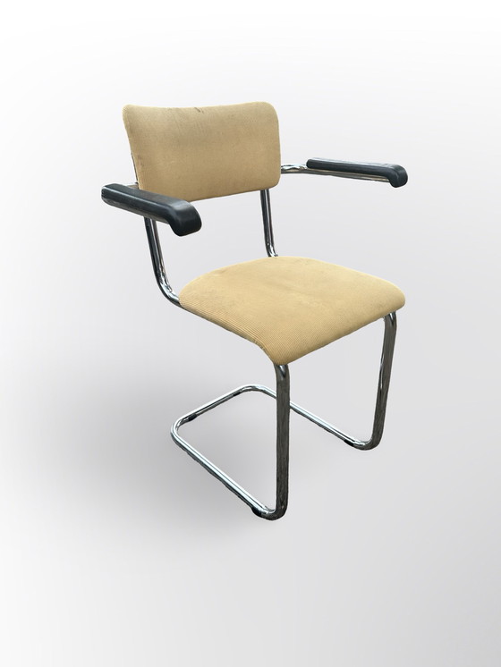 Image 1 of Cute Tube Frame Chair From The Sixties With Black Plastic Armrests.