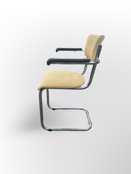 Cute Tube Frame Chair From The Sixties With Black Plastic Armrests.