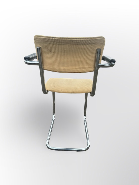 Image 1 of Cute Tube Frame Chair From The Sixties With Black Plastic Armrests.