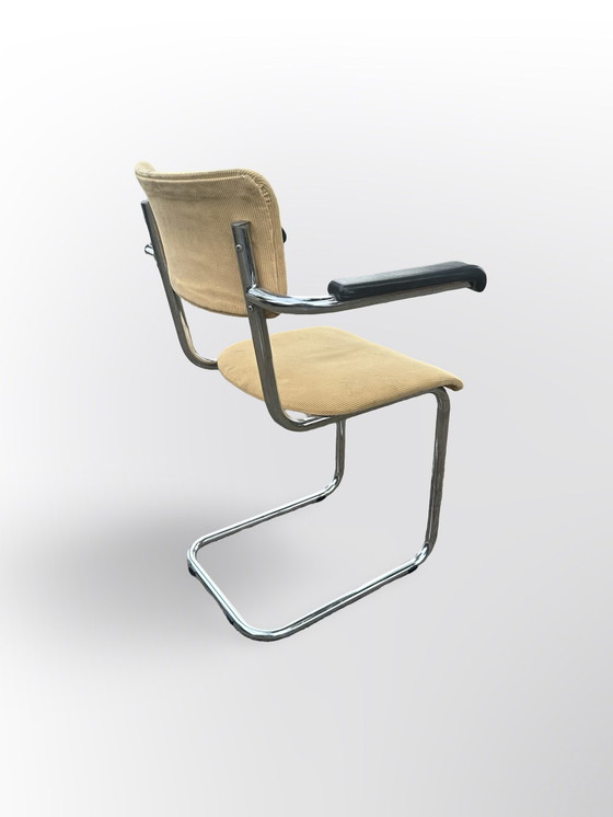 Image 1 of Cute Tube Frame Chair From The Sixties With Black Plastic Armrests.