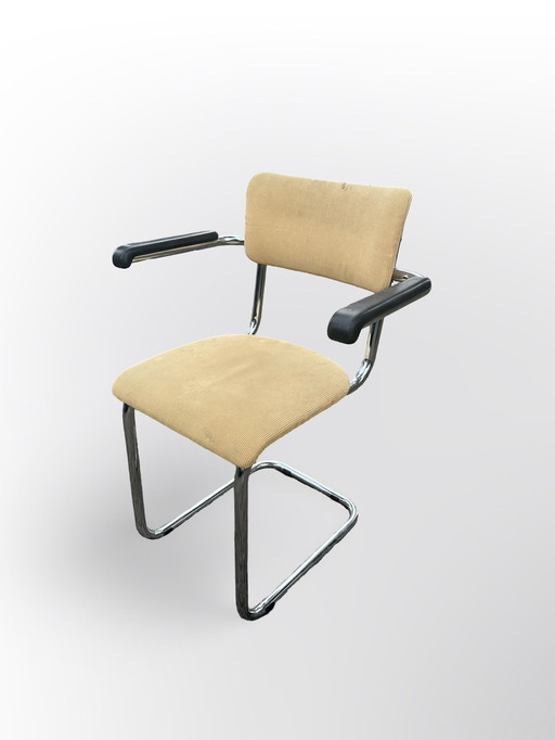 Cute Tube Frame Chair From The Sixties With Black Plastic Armrests.