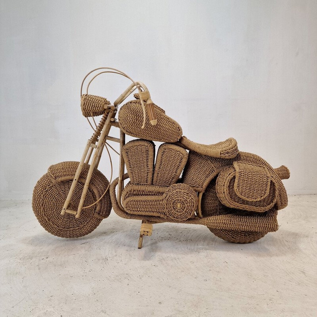 Vintage Harley Davidson motorcycle sculpture in woven rattan and