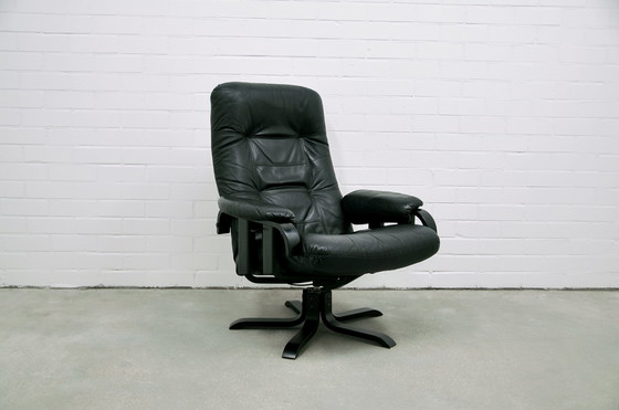 Image 1 of Swedish black leather swivel swivel chair