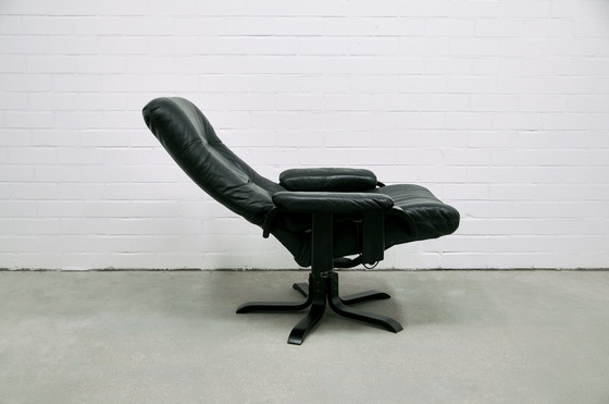 Image 1 of Swedish black leather swivel swivel chair