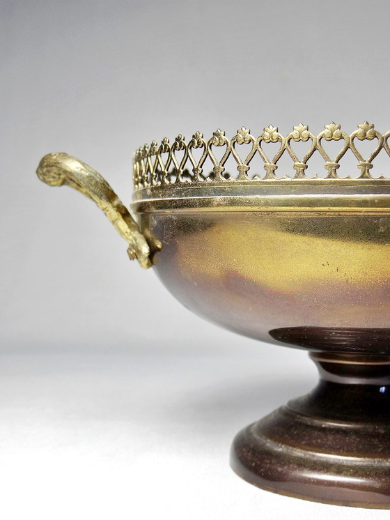 Image 1 of Brass bowl on antique patina foot with lace edges and handles