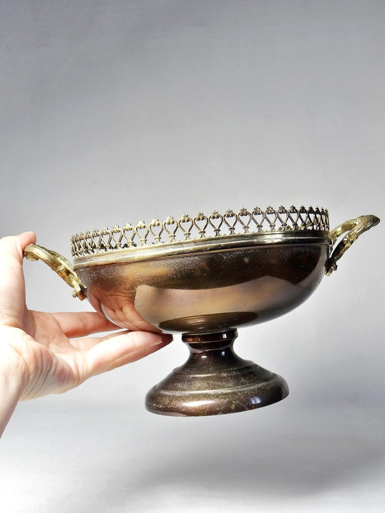 Image 1 of Brass bowl on antique patina foot with lace edges and handles