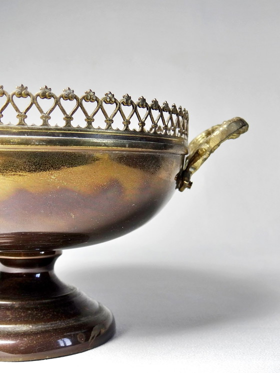 Image 1 of Brass bowl on antique patina foot with lace edges and handles