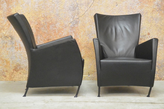 Image 1 of 2 black leather Montis Windy armchairs