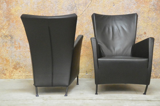 Image 1 of 2 black leather Montis Windy armchairs