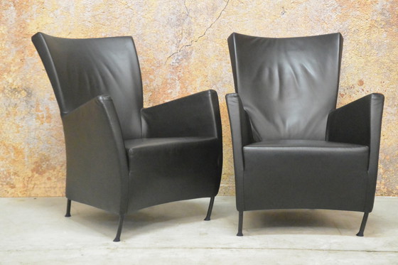 Image 1 of 2 black leather Montis Windy armchairs