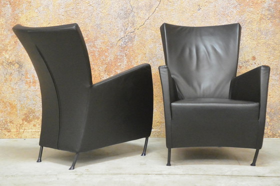 Image 1 of 2 black leather Montis Windy armchairs