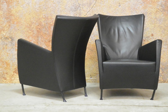 Image 1 of 2 black leather Montis Windy armchairs