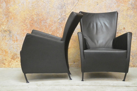 Image 1 of 2 black leather Montis Windy armchairs