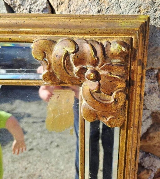 Large bevelled faceted mirror in gilded wood, early 20th century