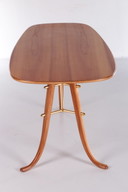Vintage Coffee Table with 3 legs and brass details Scandinavia.