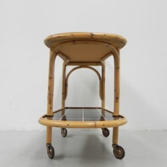 Image 1 of Bamboo, rattan serving trolley on castors - 1950s