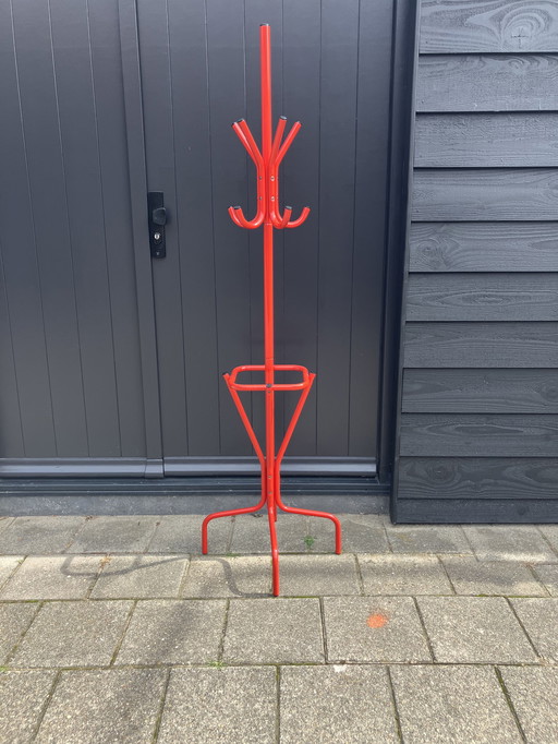 Bright red metal coat rack