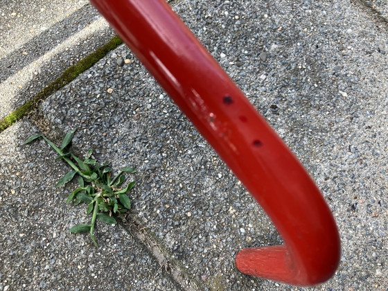 Image 1 of Bright red metal coat rack