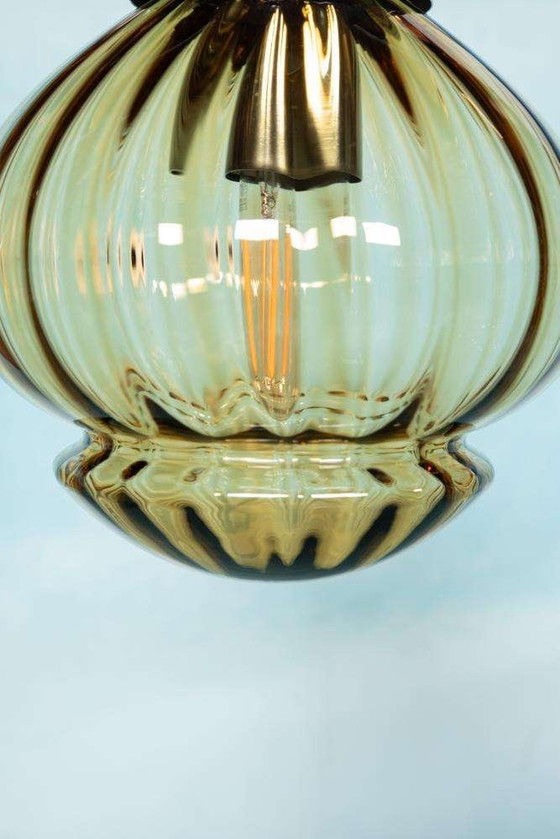 Image 1 of Vintage amber glass pendant lamp Raak Amsterdam, space age yellow glass