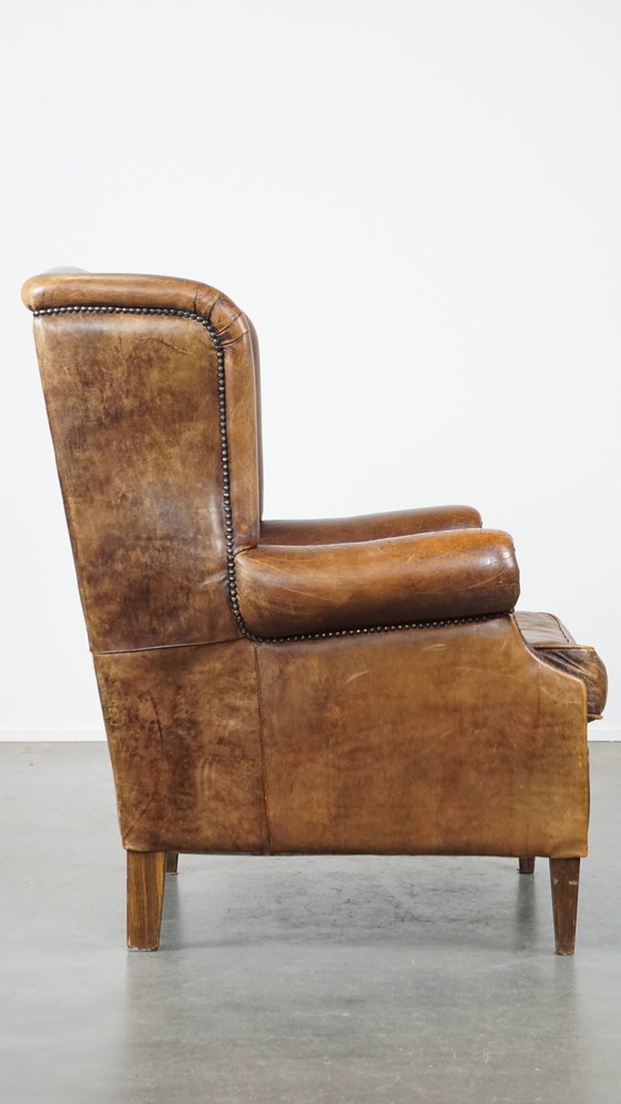 Image 1 of Grande poltrona vintage in pelle di pecora