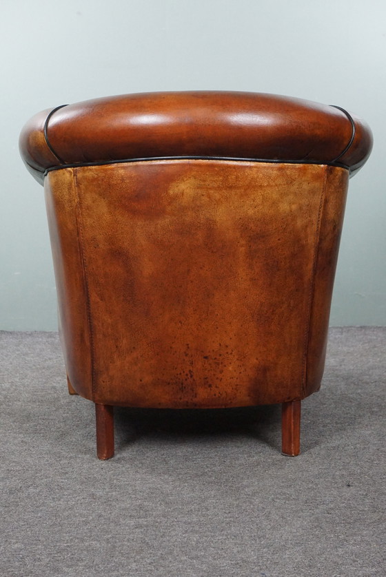 Image 1 of Sheep leather club chair in very good condition