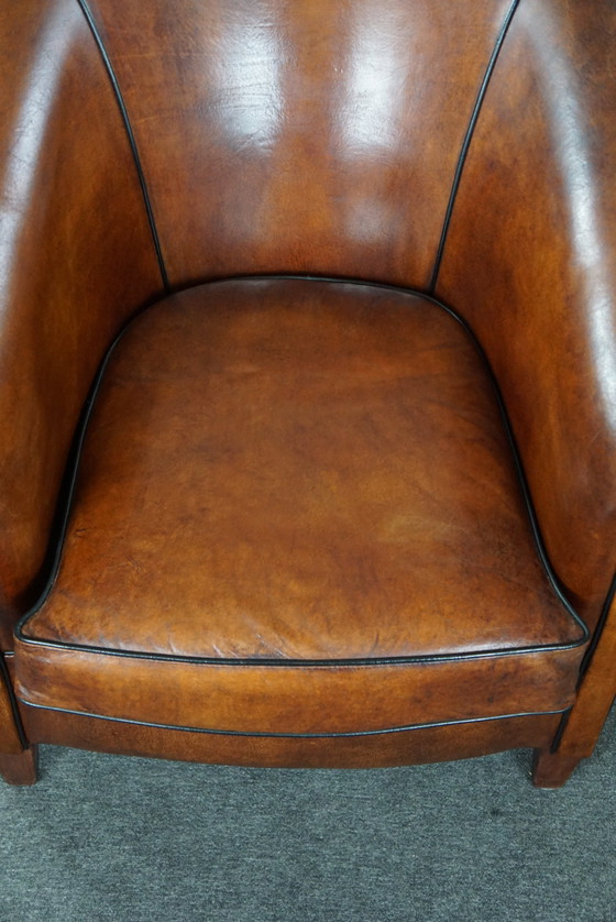 Image 1 of Sheep leather club chair in very good condition