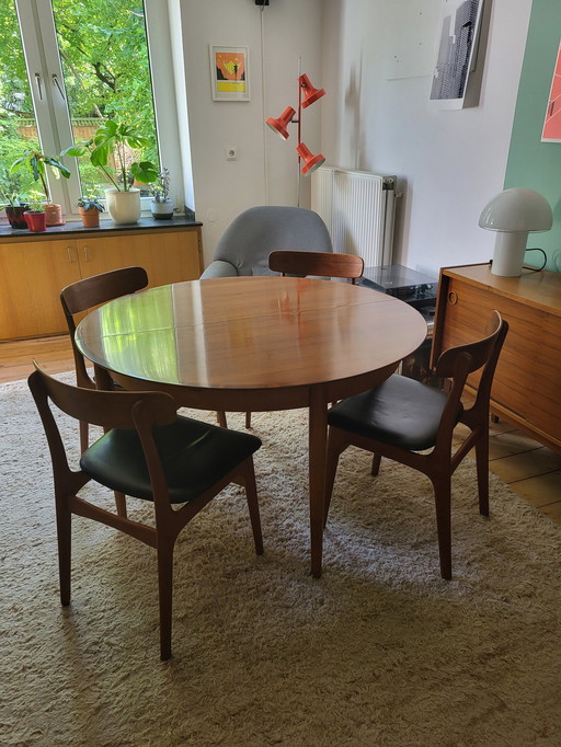 Lübke dining table round extendable teak walnut